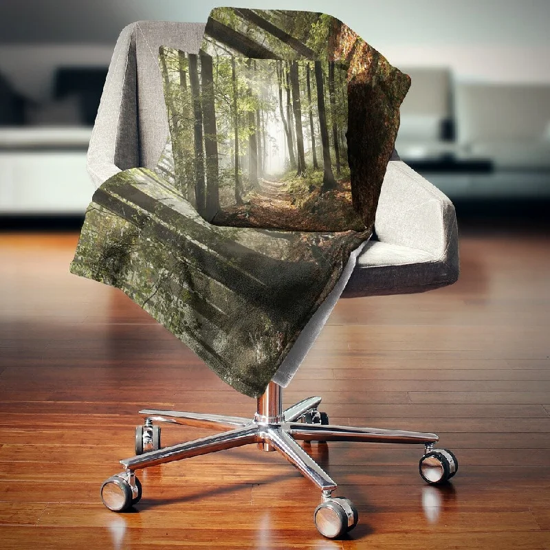Chenille blankets with a thick and fuzzy textureDesignart 'Green Fall Forest with Sun Rays' Landscape Photography Throw Blanket