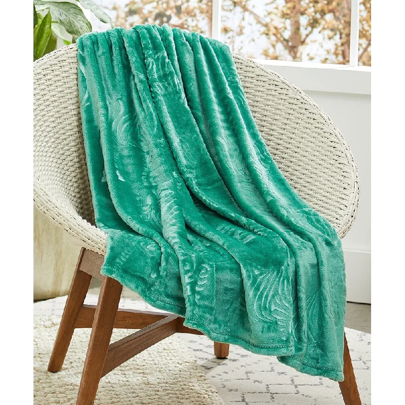 Cotton blankets for breathability and a lightweight feelZebra Throw Green