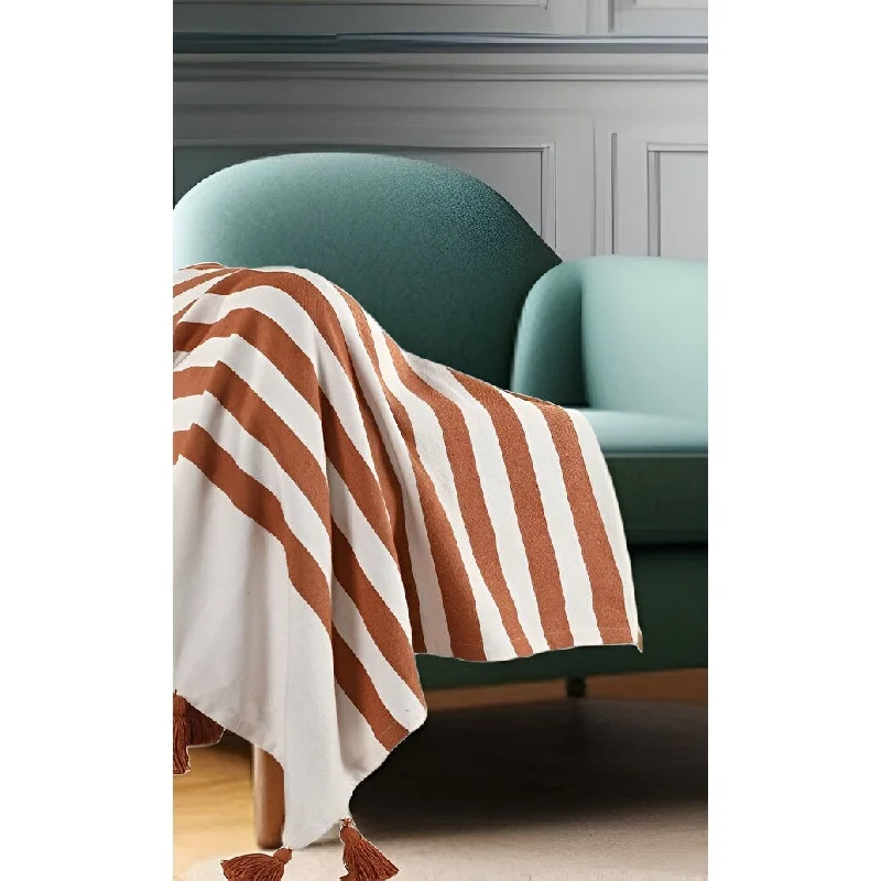 Cotton blankets for breathability and a lightweight feel50" X 60" Orange Woven Cotton Striped Throw Blanket with Tassels