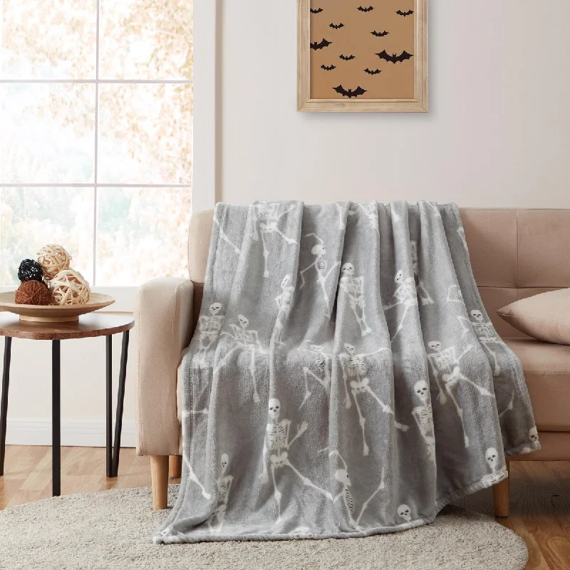 Cotton blankets for breathability and a lightweight feelDancing Skelly Glow in the Dark Throw 50" x 70"