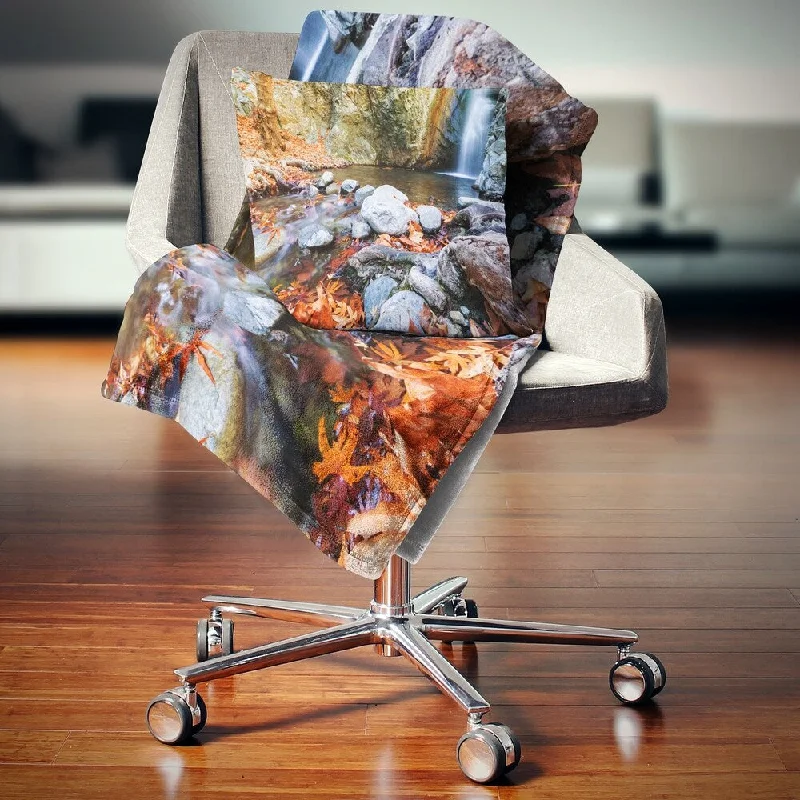 Fleece blankets for a cozy and plush textureDesignart 'Beautiful Serenity Waterfall in Cyprus' Landscape Wall Throw Blanket