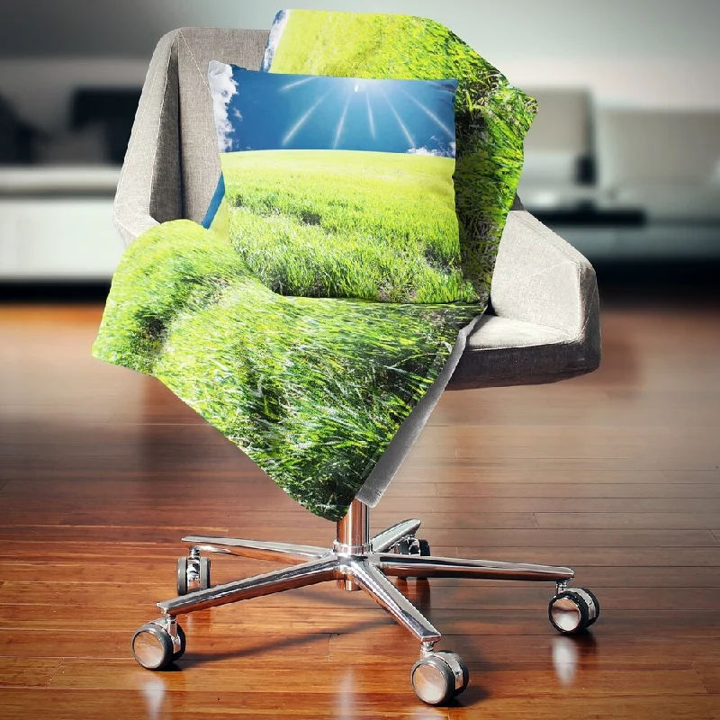 Cotton blankets for breathability and a lightweight feelDesignart 'Sunny Field with Green Grassland' Landscape Fleece Throw Blanket