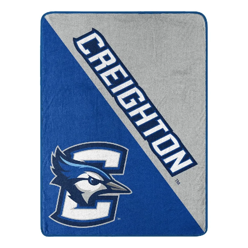 Cotton blankets for breathability and a lightweight feelCOL 659 Creighton Halftone Micro