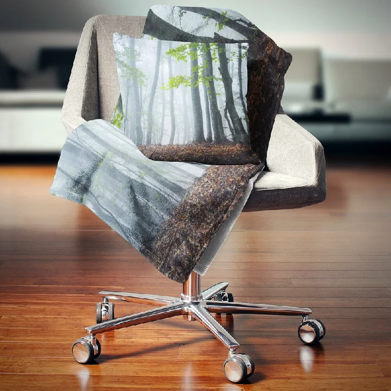 Fleece blankets for a cozy and plush textureDesignart 'Green Leaves in Old Forest' Landscape Photography Throw Blanket