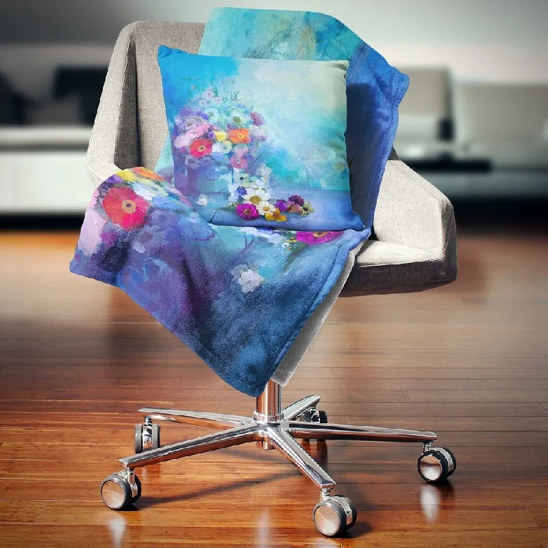 Synthetic fiber blend blankets for a budget - friendly choiceDesignart 'Little Flowers on Blue Background' Floral Throw Blanket